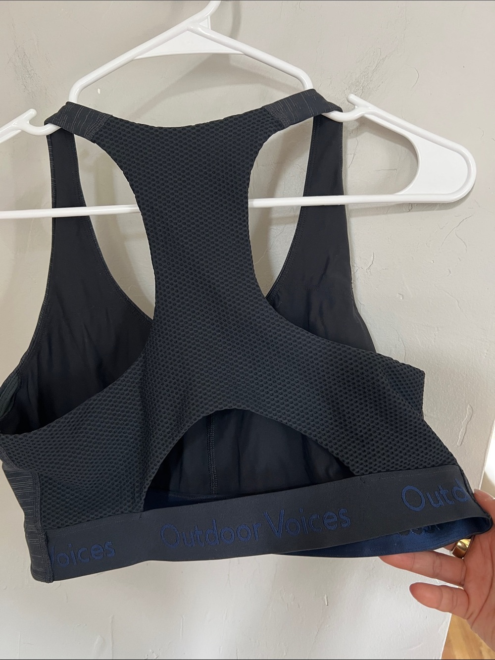 Outdoor Voices heather black sports bra w/ name logos on elastic band